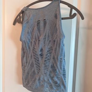 ALO yoga or everyday shirt.  Sleeveless.